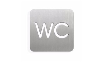 Ein modernes WC-Schild aus Edelstahl. Die Buchstaben "WC" sind deutlich sichtbar und sauber gestaltet. | © Barrierefreies WC